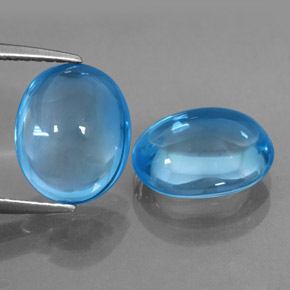 Gemas de topacio azul natural de  ct, corte óvalo, transparente