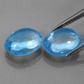 Gemas de topacio azul natural de  ct, corte óvalo, transparente