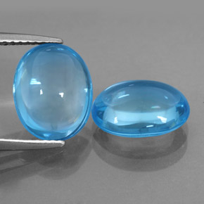 Gemas de topacio azul natural de  ct, corte óvalo, transparente