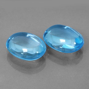 Gemas de topacio azul natural de  ct, corte óvalo, transparente