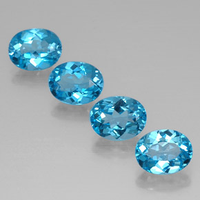Gemas de topacio azul natural de  ct, corte óvalo, VVS