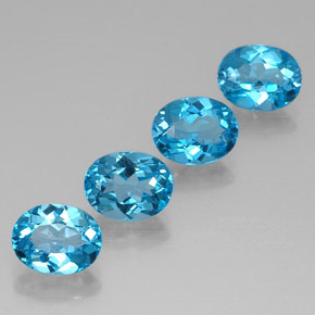Gemas de topacio azul natural de  ct, corte óvalo, VVS