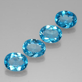 Gemas de topacio azul natural de  ct, corte óvalo, VVS