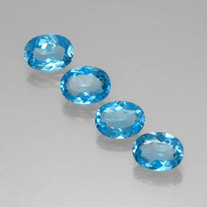 Gemas de topacio azul natural de  ct, corte óvalo, VVS
