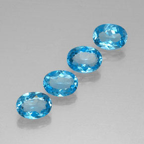 Gemas de topacio azul natural de  ct, corte óvalo, VVS
