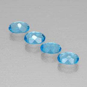 Gemas de topacio azul natural de  ct, corte óvalo, VVS