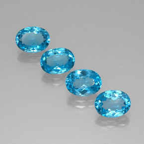 Gemas de topacio azul natural de  ct, corte óvalo, VVS
