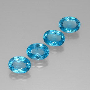Gemas de topacio azul natural de  ct, corte óvalo, VVS