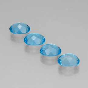 Gemas de topacio azul natural de  ct, corte óvalo, VVS