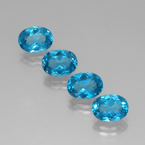 Gemas de topacio azul natural de  ct, corte óvalo, VVS