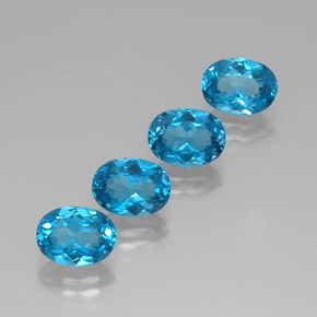 Gemas de topacio azul natural de  ct, corte óvalo, VVS