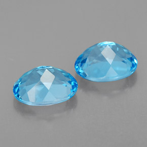 Gemas de topacio azul natural de  ct, corte óvalo, VVS