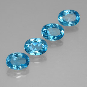 Gemas de topacio azul natural de  ct, corte óvalo, VVS