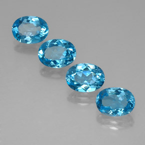 Gemas de topacio azul natural de  ct, corte óvalo, VVS