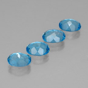 Gemas de topacio azul natural de  ct, corte óvalo, VVS
