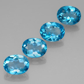 Gemas de topacio azul natural de  ct, corte óvalo, VVS