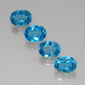 Gemas de topacio azul natural de  ct, corte óvalo, VVS