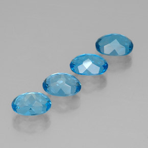 Gemas de topacio azul natural de  ct, corte óvalo, VVS