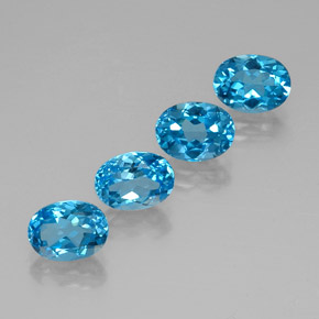 Gemas de topacio azul natural de  ct, corte óvalo, VVS