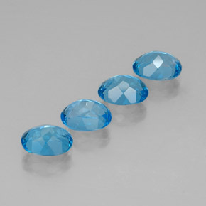 Gemas de topacio azul natural de  ct, corte óvalo, VVS