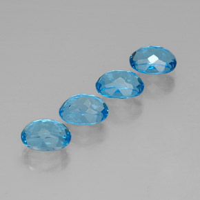 Gemas de topacio azul natural de  ct, corte óvalo, VVS