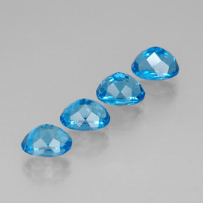 Gemas de topacio azul natural de  ct, corte óvalo, VVS