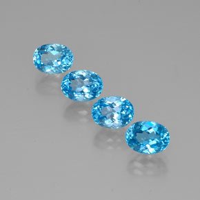 Gemas de topacio azul natural de  ct, corte óvalo, VVS
