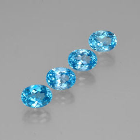 Gemas de topacio azul natural de  ct, corte óvalo, VVS