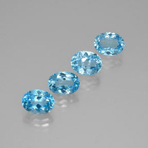 Gemas de topacio azul natural de  ct, corte óvalo, VVS