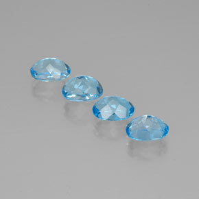 Gemas de topacio azul natural de  ct, corte óvalo, VVS