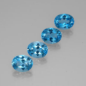 Gemas de topacio azul natural de  ct, corte óvalo, VVS