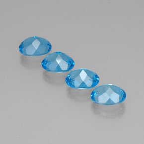 Gemas de topacio azul natural de  ct, corte óvalo, VVS