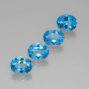 Gemas de topacio azul natural de  ct, corte óvalo, VVS