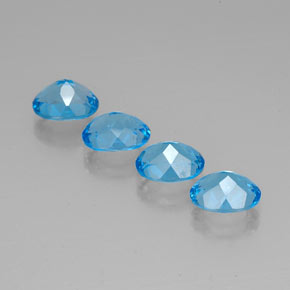 Gemas de topacio azul natural de  ct, corte óvalo, VVS