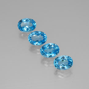 Gemas de topacio azul natural de  ct, corte óvalo, VVS