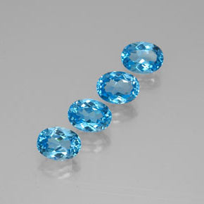 Gemas de topacio azul natural de  ct, corte óvalo, VVS