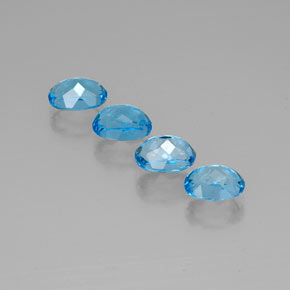 Gemas de topacio azul natural de  ct, corte óvalo, VVS