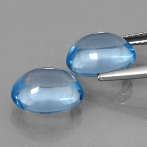 Gemas de topacio azul natural de  ct, corte óvalo, transparente