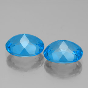 Gemas de topacio azul natural de  ct, corte óvalo, VVS-VS