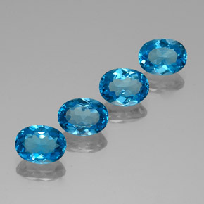 Gemas de topacio azul natural de  ct, corte óvalo, VVS-VS