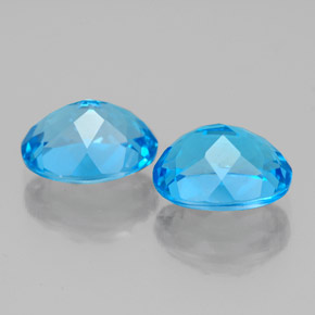 Gemas de topacio azul natural de  ct, corte óvalo, VS