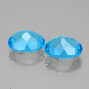 Gemas de topacio azul natural de  ct, corte óvalo, VS