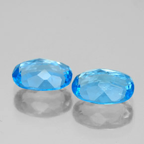Gemas de topacio azul natural de  ct, corte óvalo, VS