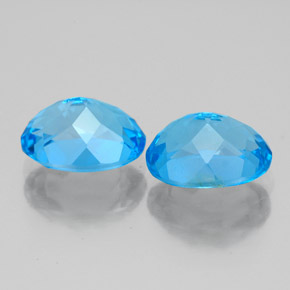 Gemas de topacio azul natural de  ct, corte óvalo, VS
