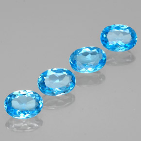 Gemas de topacio azul natural de  ct, corte óvalo, VS