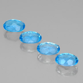 Gemas de topacio azul natural de  ct, corte óvalo, VS
