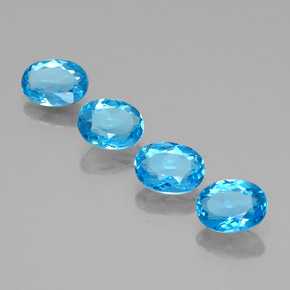 Gemas de topacio azul natural de  ct, corte óvalo, VS