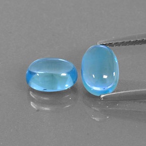 Gemas de topacio azul natural de  ct, corte óvalo, transparente