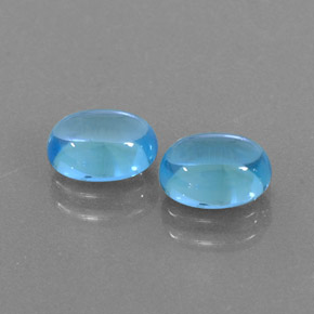 Gemas de topacio azul natural de  ct, corte óvalo, transparente