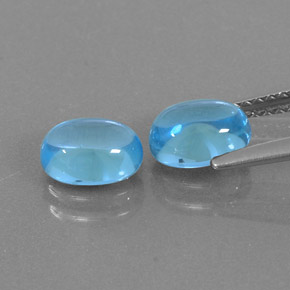 Gemas de topacio azul natural de  ct, corte óvalo, transparente